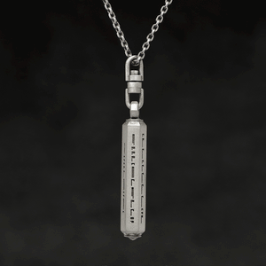 Rotating view of Code of Gratitude hexagonal sterling silver pendant and chain with endless loop necklace featuring ASCII Rays Code by Caps Brothers