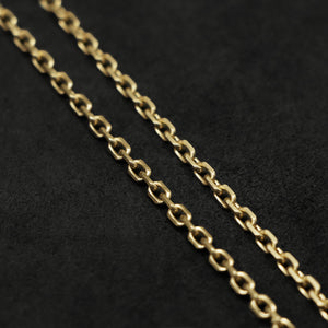 Chain closeup of Journey 18K Yellow Gold with endless loop necklace by Caps Brothers