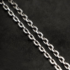 Chain closeup of Code of Power sterling silver chain with endless loop necklace by Caps Brothers