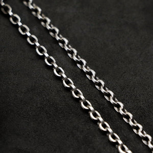 Chain closeup of Code of Gratitude sterling silver chain with endless loop necklace by Caps Brothers