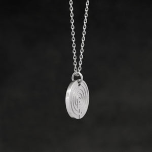 Side view of Platinum 950 Journey pendant and chain with endless loop necklace featuring labyrinth as inward journey by Caps Brothers