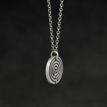 Load image into Gallery viewer, Side view of Sterling Silver Journey pendant and chain necklace featuring labyrinth as inward journey by Caps Brothers