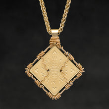 Load image into Gallery viewer, Hanging reverse view of 18K Yellow Gold and 18K Palladium White Gold Sewn Gold Metal Confidence pendant and chain with endless loop necklace featuring Electromagnetic Field and Cardinal Directions by Caps Brothers