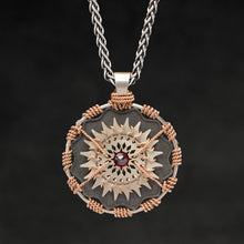 Load image into Gallery viewer, Hanging front view of 18K Rose Gold and 18K Palladium White Gold and Sterling Silver and Ruby Sewn Gold Metal Majesty pendant and chain with endless loop necklace featuring 20 pointed gear by Caps Brothers