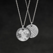 Load image into Gallery viewer, Hanging view of Platinum 950 Journey pendant and chain with endless loop necklace featuring the Map of Humanity as outward journey and labyrinth as inward journey by Caps Brothers