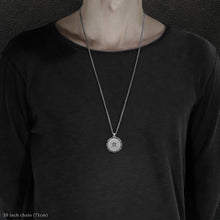 Load image into Gallery viewer, Model wearing Platinum 950 Sewn Platinum Metal Compass pendant and chain with endless loop necklace featuring 20 pointed gear by Caps Brothers