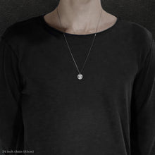 Load image into Gallery viewer, Model wearing Platinum 950 Journey pendant and chain with endless loop necklace featuring the Map of Humanity as outward journey by Caps Brothers