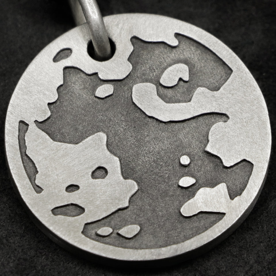 Detail view of Sterling Silver Journey pendant featuring the Map of Humanity as outward journey as outward journey by Caps Brothers