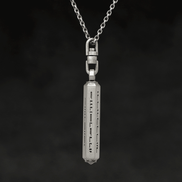 Rotating view of Code of Gratitude hexagonal sterling silver pendant and chain with endless loop necklace featuring ASCII Rays Code by Caps Brothers