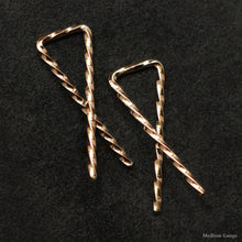 Load image into Gallery viewer, Detail view of 18K Rose Gold Sibling Ribbons Twisted Earrings representing we are all brothers and sisters by Caps Brothers