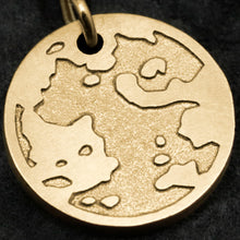 Load image into Gallery viewer, Detail view of 18K Yellow Gold Journey pendant featuring the Map of Humanity as outward journey by Caps Brothers