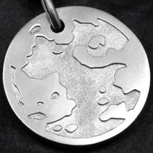 Load image into Gallery viewer, Detail view of Platinum 950 Journey pendant featuring the Map of Humanity as outward journey by Caps Brothers