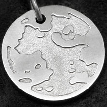 Load image into Gallery viewer, Detail view of Platinum 950 Journey pendant featuring the Map of Humanity as outward journey by Caps Brothers