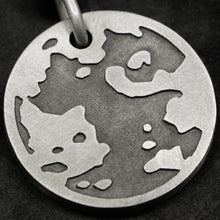 Load image into Gallery viewer, Detail view of Sterling Silver Journey pendant featuring the Map of Humanity as outward journey by Caps Brothers