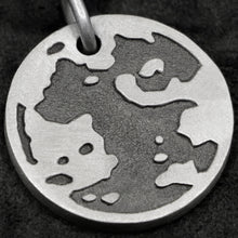 Load image into Gallery viewer, Detail view of Sterling Silver Journey pendant featuring the Map of Humanity as outward journey by Caps Brothers