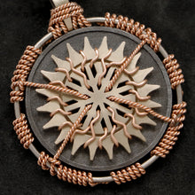 Load image into Gallery viewer, Detail view of 18K Rose Gold and 18K Palladium White Gold and Sterling Silver Sewn Silver Metal Sun pendant featuring 20 pointed gear by Caps Brothers