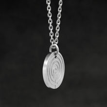 Load image into Gallery viewer, Side view of Platinum 950 Journey pendant featuring labyrinth as inward journey by Caps Brothers