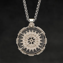 Load image into Gallery viewer, Hanging front view of 18K Palladium White Gold and Sterling Silver Sewn Gold Metal Compass pendant and chain with endless loop necklace featuring 20 pointed gear by Caps Brothers