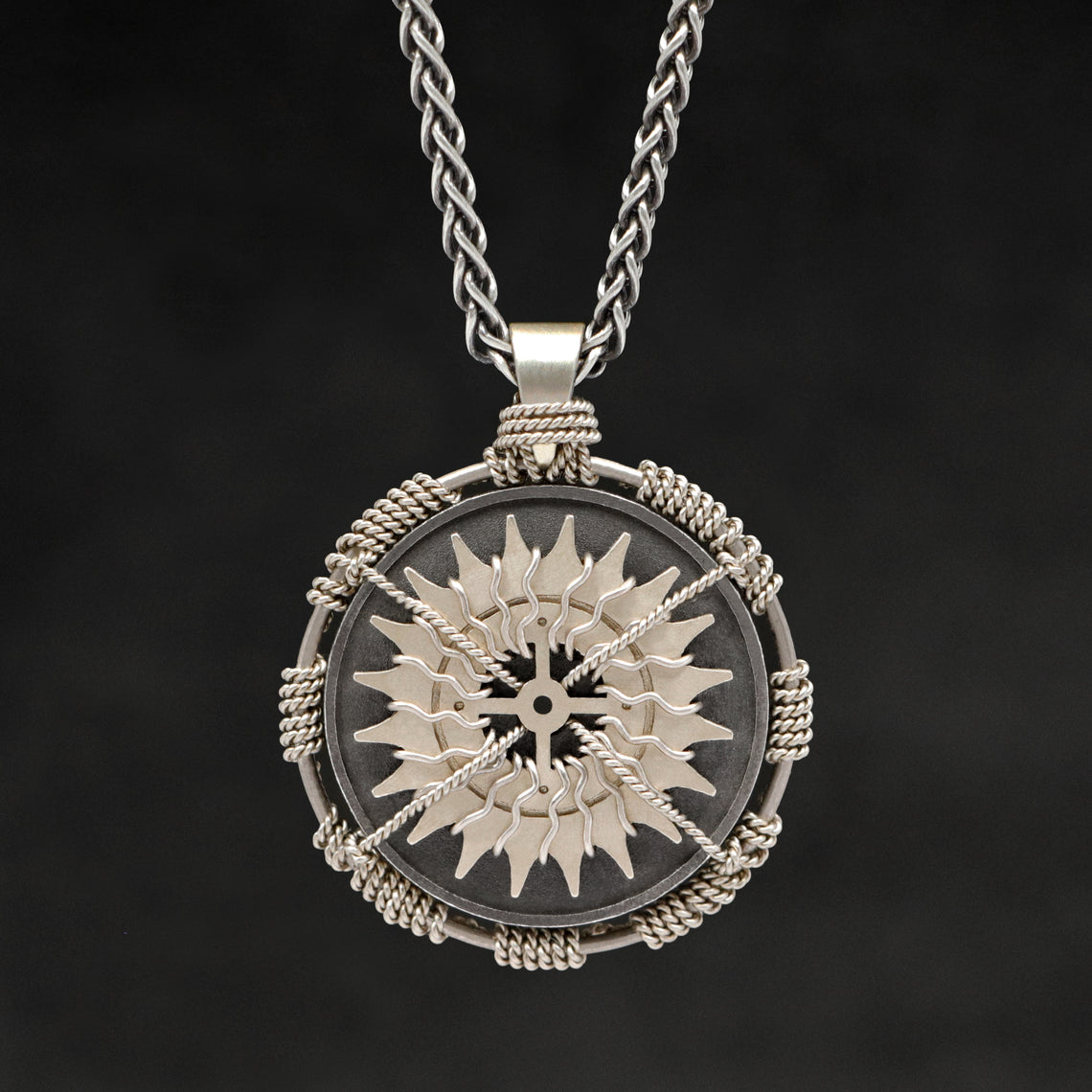 Hanging front view of 18K Palladium White Gold and Sterling Silver Sewn Gold Metal Compass pendant and chain with endless loop necklace featuring 20 pointed gear by Caps Brothers