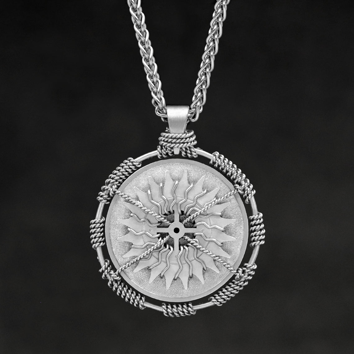 Hanging front view of Platinum 950 Sewn Platinum Metal Compass pendant and chain with endless loop necklace featuring 20 pointed gear by Caps Brothers