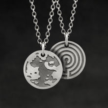 Load image into Gallery viewer, Hanging view of Sterling Silver Journey pendant and chain with endless loop necklace featuring the Map of Humanity as outward journey and labyrinth as inward journey by Caps Brothers