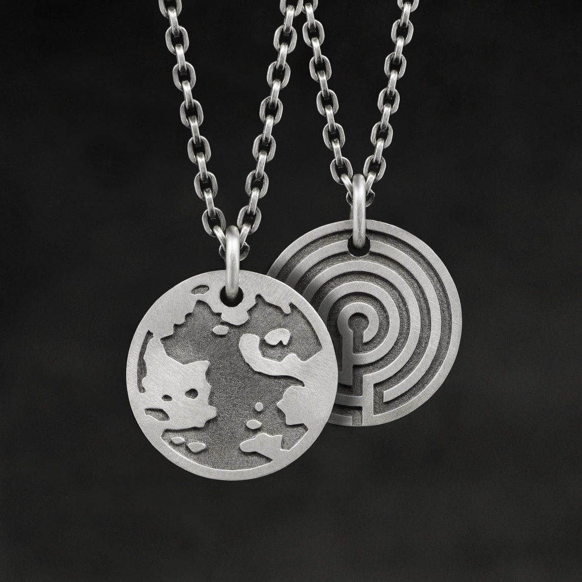 Hanging view of Sterling Silver Journey pendant and chain with endless loop necklace featuring the Map of Humanity as outward journey and labyrinth as inward journey by Caps Brothers