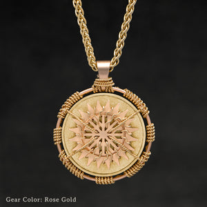 Hanging front view of 18K Yellow Gold Sewn Gold Metal Sun pendant with alternate 18K Rose Gold Gear and 18K yellow gold chain with endless loop necklace featuring 20 pointed gear by Caps Brothers