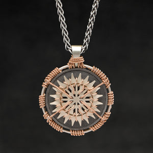 Hanging front view of 18K Rose Gold and 18K Palladium White Gold and Sterling Silver Sewn Silver Metal Sun pendant and chain with endless loop necklace featuring 20 pointed gear by Caps Brothers