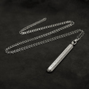 Laying down Code of Consciousness hexagonal sterling silver pendant and chain with endless loop necklace featuring Dashless Morse Code by Caps Brothers